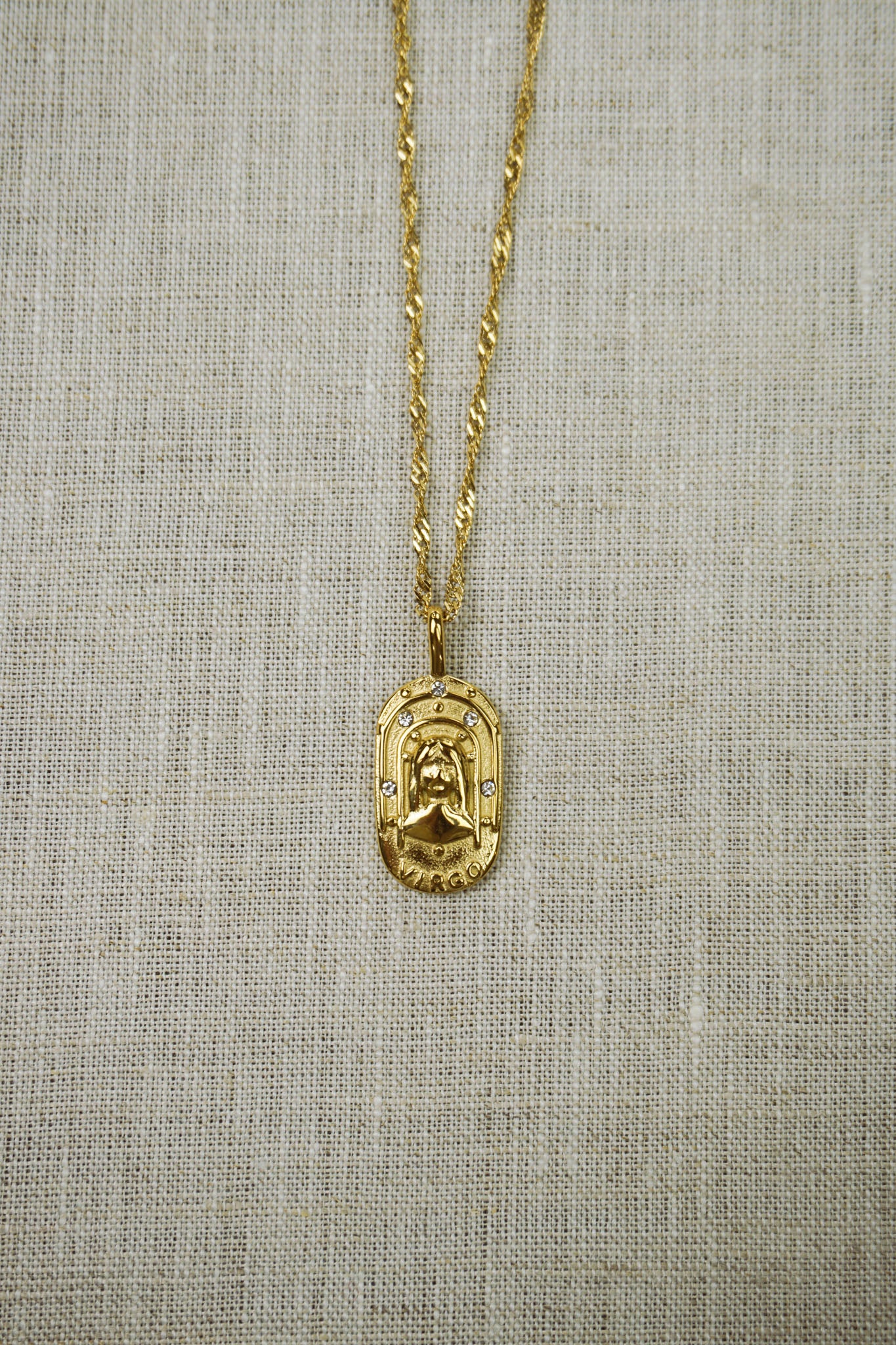Gold thin dainty necklace with a virgo zodiac pendant