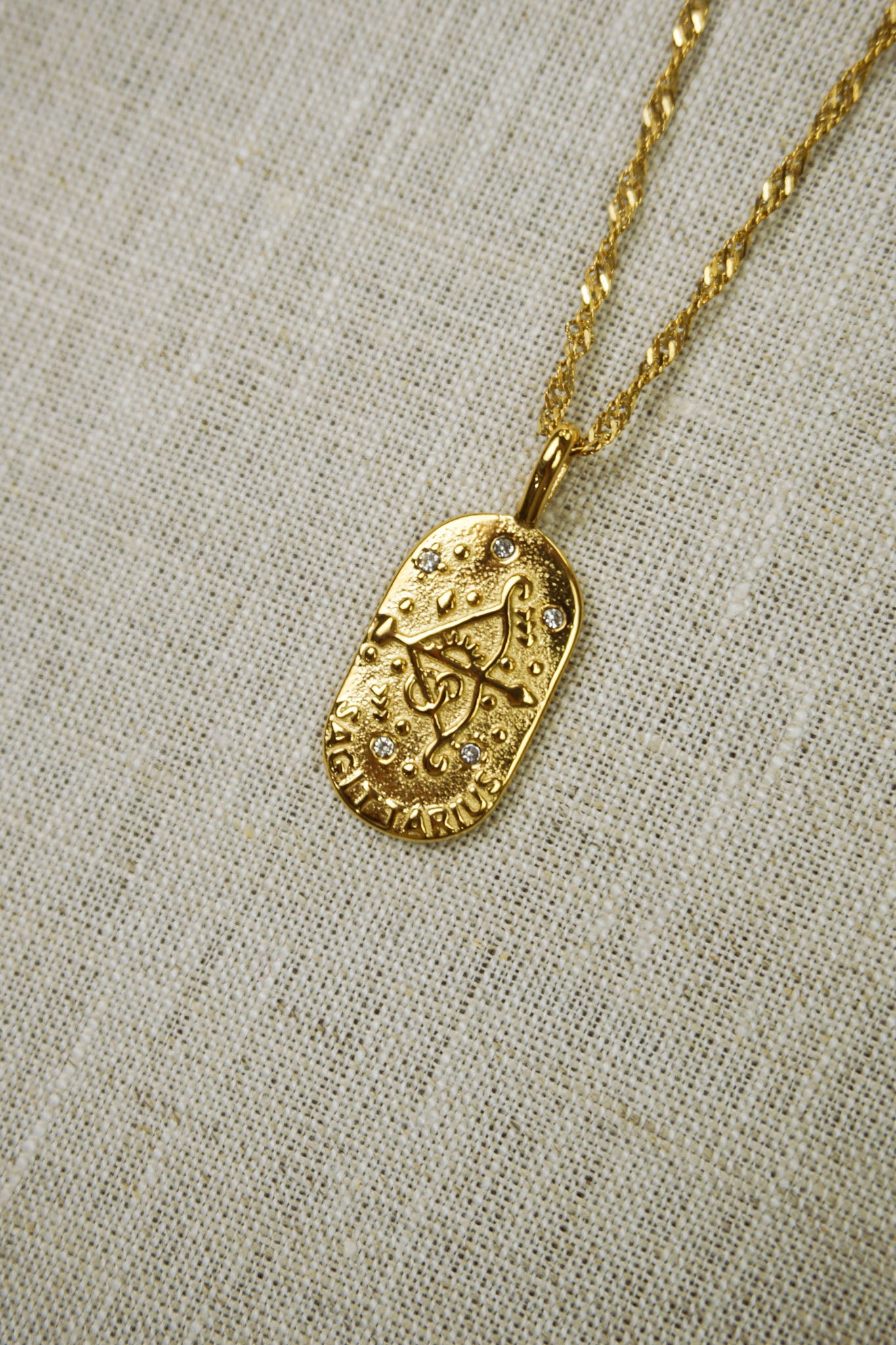 Gold thin dainty necklace with a sagittarius zodiac pendant
